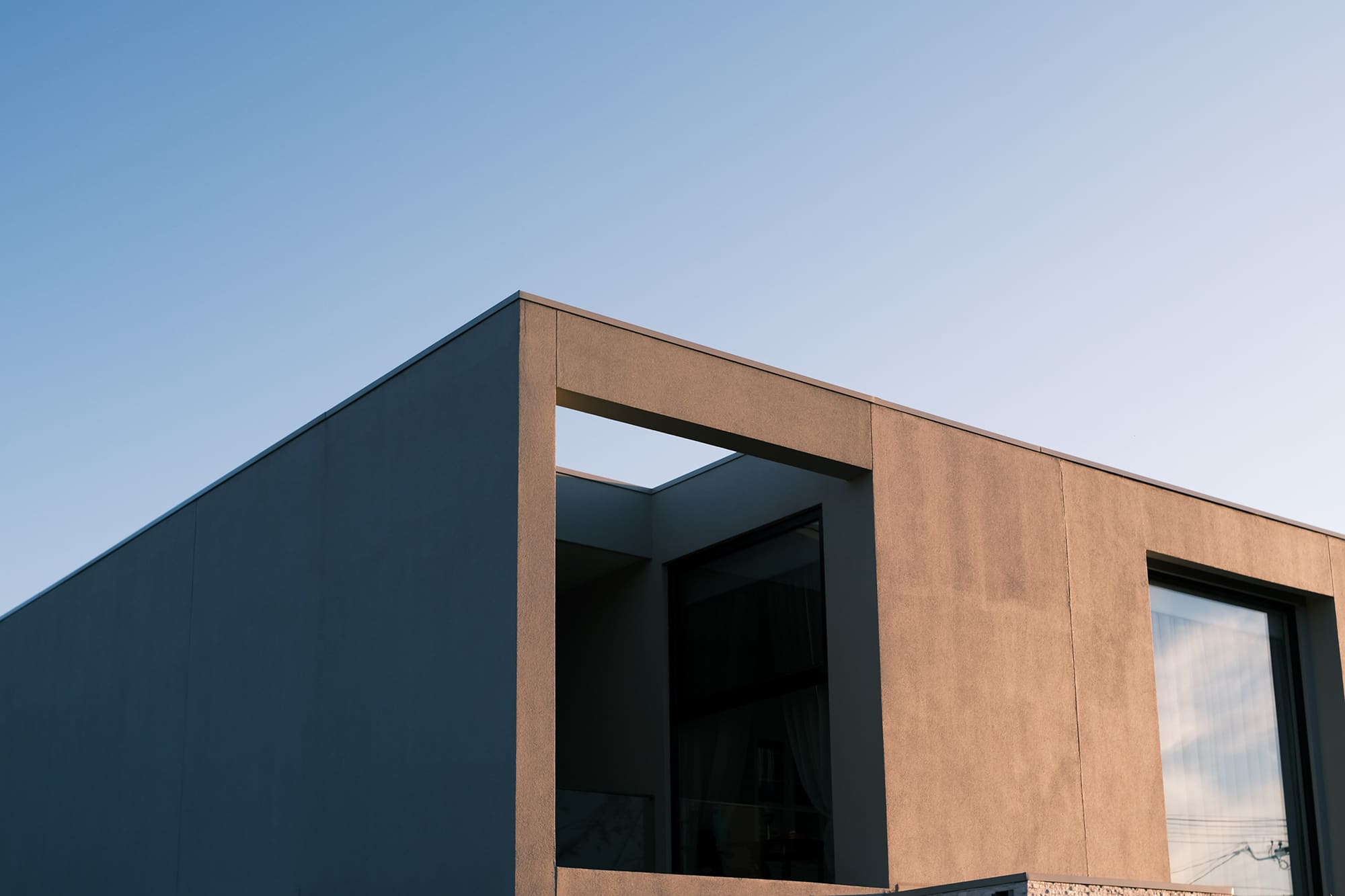 Brown concrete building under blue sky during daytime